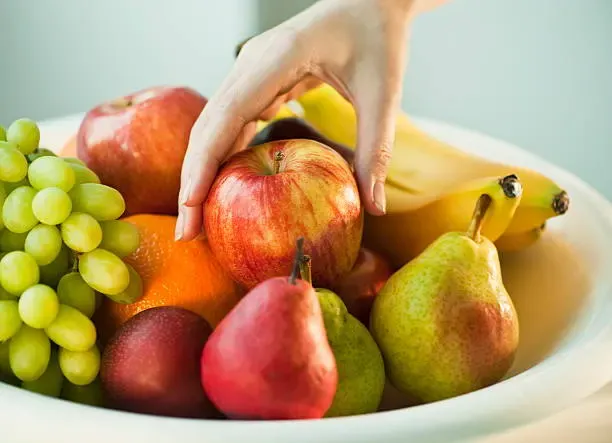 A vibrant selection of fresh, fiber-rich fruits supporting digestive wellness