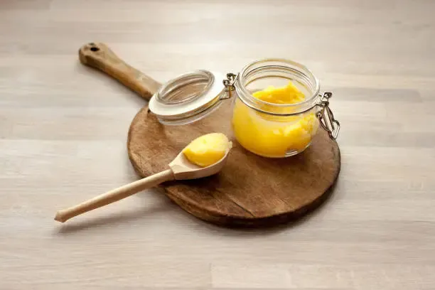 Pure ghee or clarified butter in a container